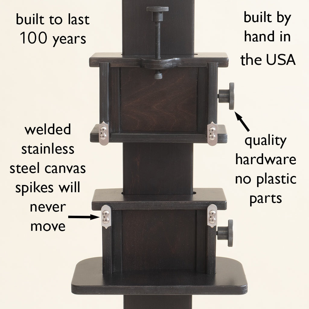 Close-up of the Geneva Studio Easel canvas clamps with welded stainless steel canvas spikes and metal hardware