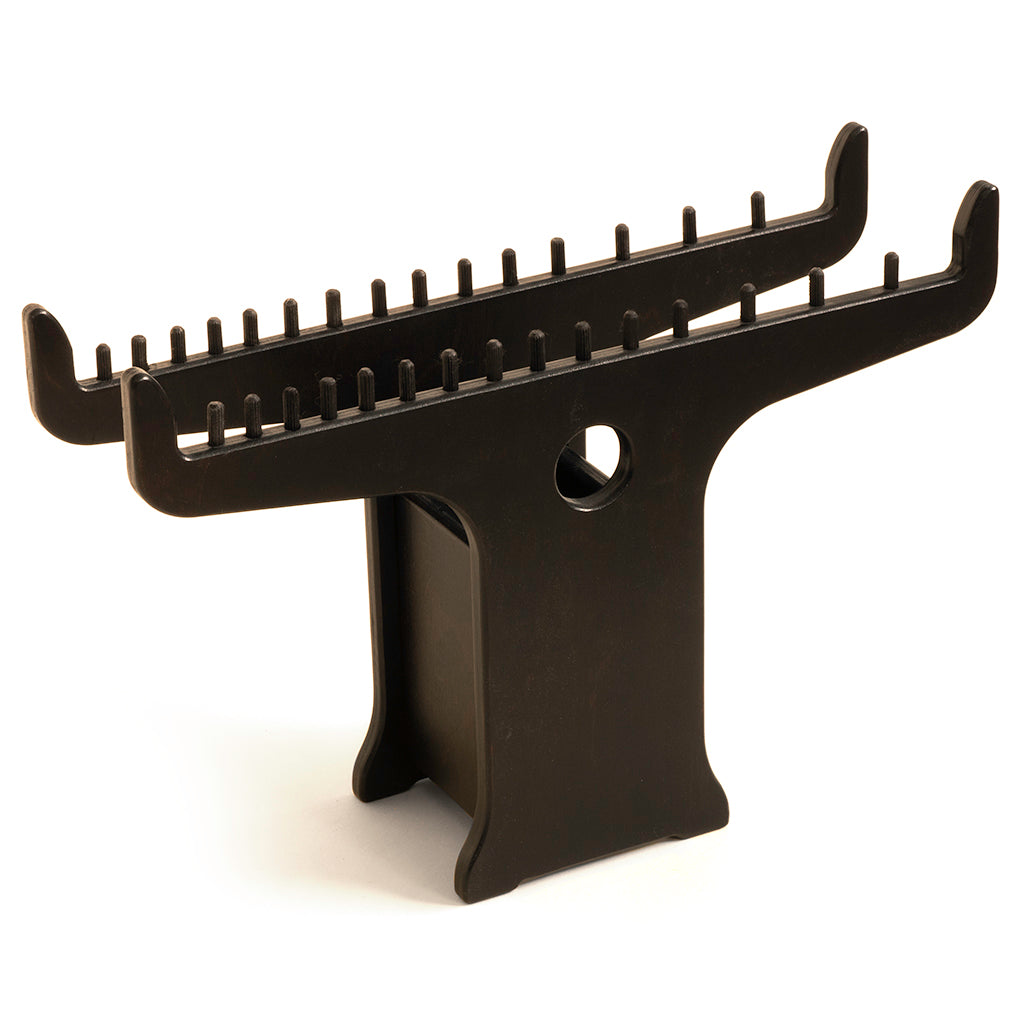 Black Geneva Brush Holder from the front, showing the two angled brush rails and the round hole in the center stand