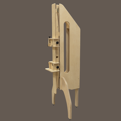 Side view of an unpainted wood Geneva Studio Easel standing on its legs